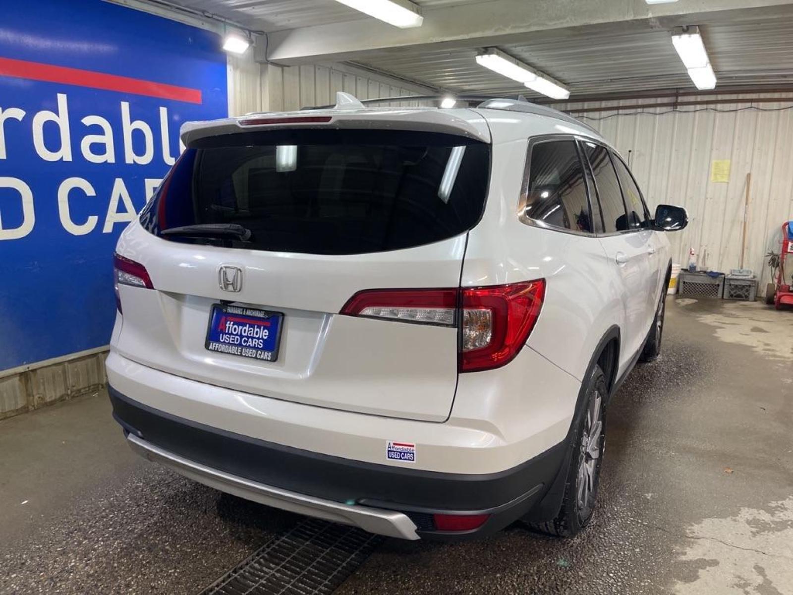 2020 WHITE HONDA PILOT EXL (5FNYF5H52LB) with an 3.5L engine, Automatic transmission, located at 2525 S. Cushman, Fairbanks, AK, 99701, (907) 452-5707, 64.824799, -147.711899 - Photo #2