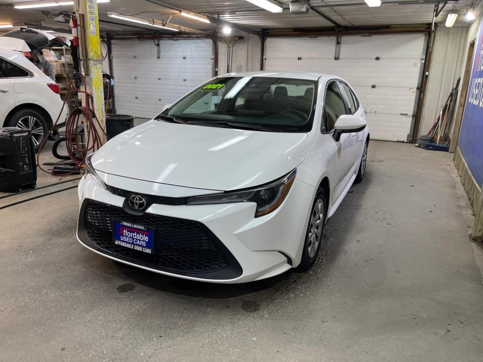 2021 WHITE TOYOTA COROLLA LE (5YFEPMAE2MP) with an 1.8L engine, Continuously Variable transmission, located at 2525 S. Cushman, Fairbanks, AK, 99701, (907) 452-5707, 64.824799, -147.711899 - Photo #1