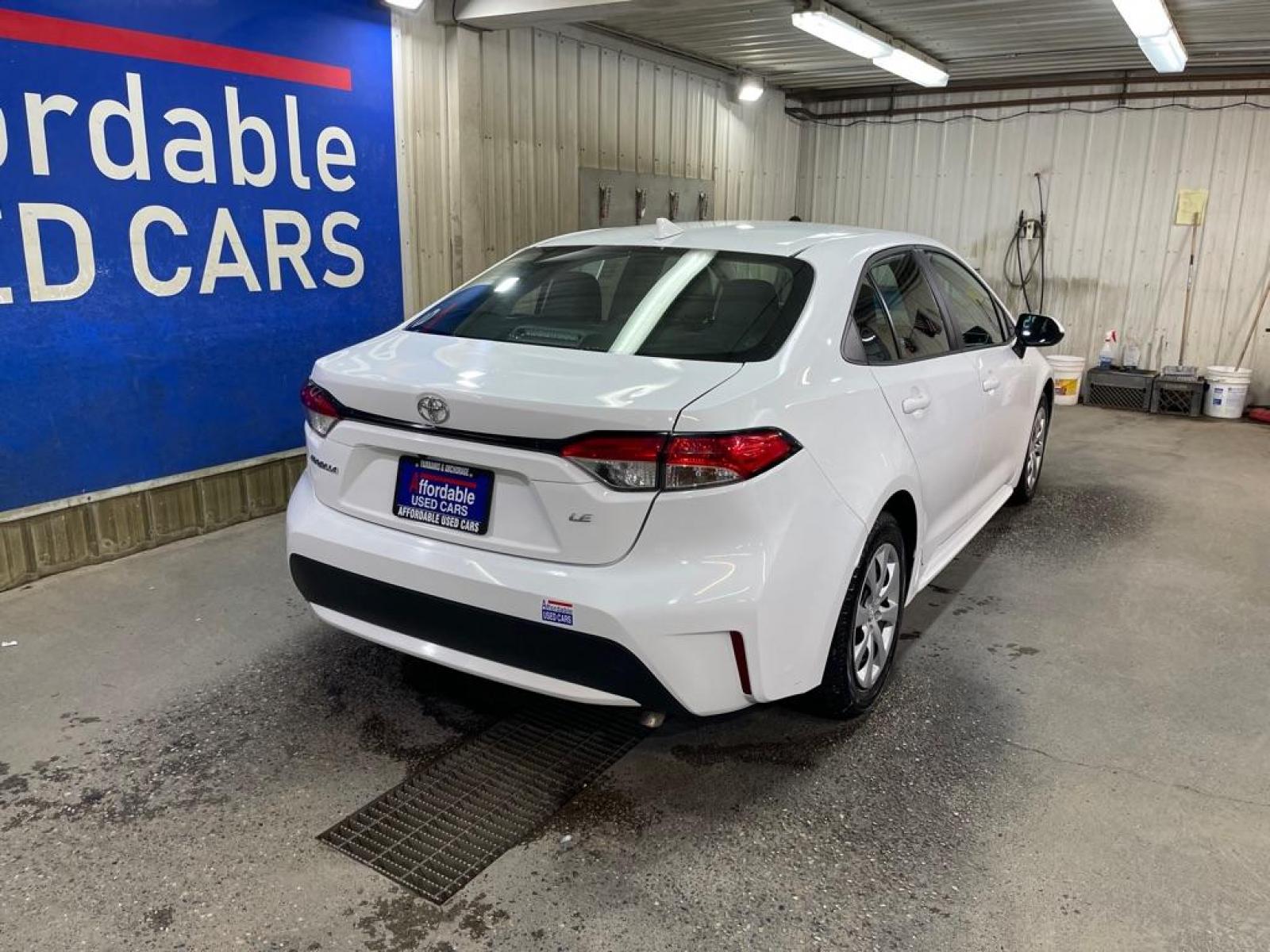 2021 WHITE TOYOTA COROLLA LE (5YFEPMAE2MP) with an 1.8L engine, Continuously Variable transmission, located at 2525 S. Cushman, Fairbanks, AK, 99701, (907) 452-5707, 64.824799, -147.711899 - Photo #2
