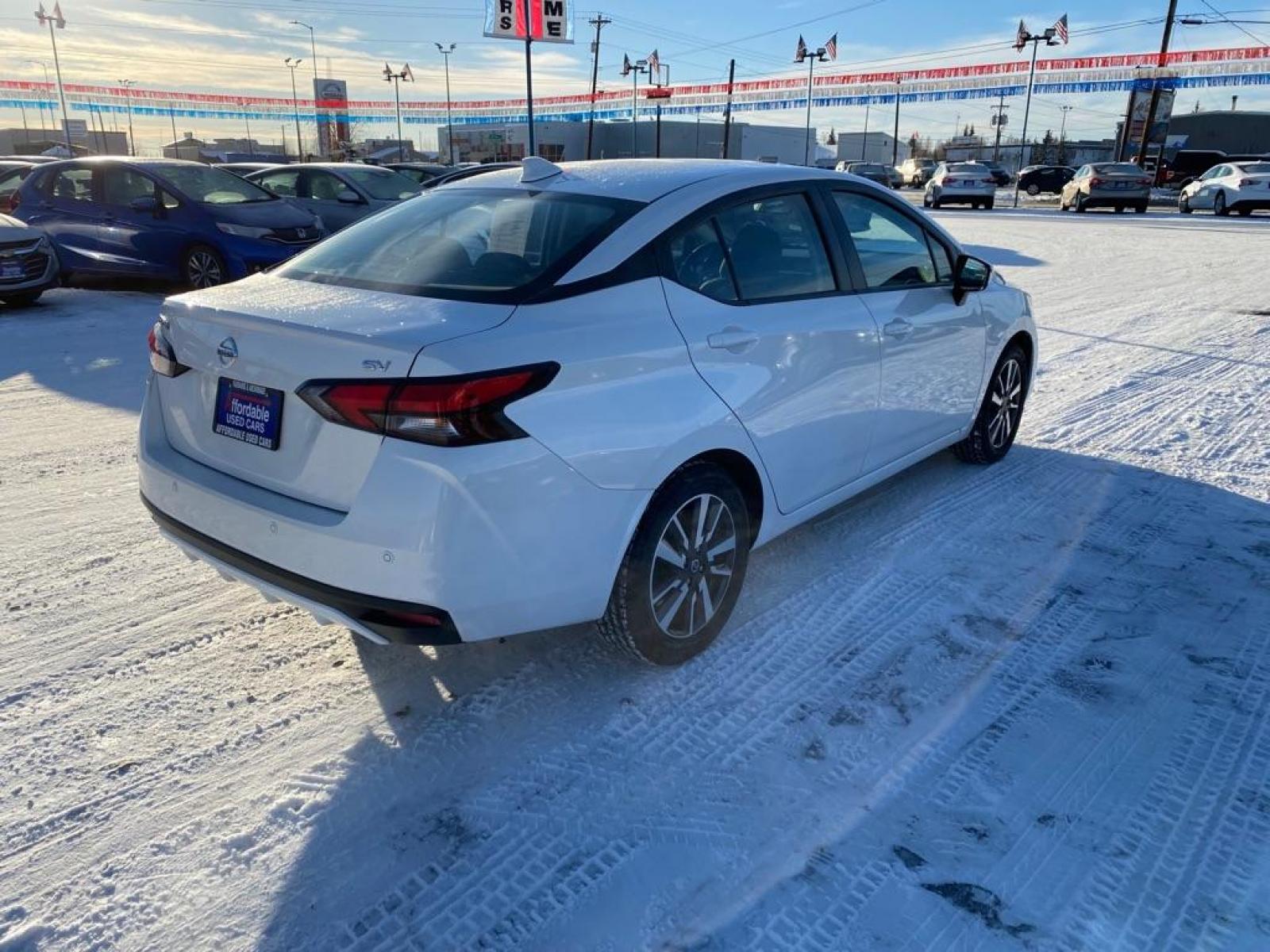 2021 WHITE NISSAN VERSA SV (3N1CN8EV9ML) with an 1.6L engine, Continuously Variable transmission, located at 2525 S. Cushman, Fairbanks, AK, 99701, (907) 452-5707, 64.824799, -147.711899 - Photo #2