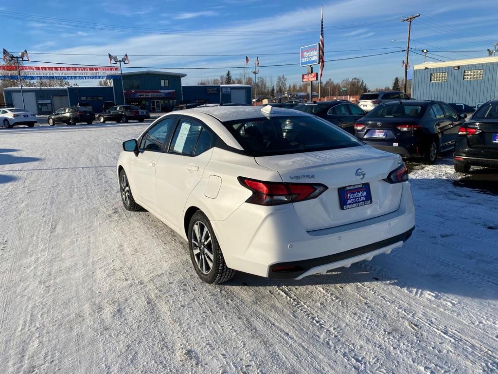 2021 WHITE NISSAN VERSA SV (3N1CN8EV9ML) with an 1.6L engine, Continuously Variable transmission, located at 2525 S. Cushman, Fairbanks, AK, 99701, (907) 452-5707, 64.824799, -147.711899 - Photo #3